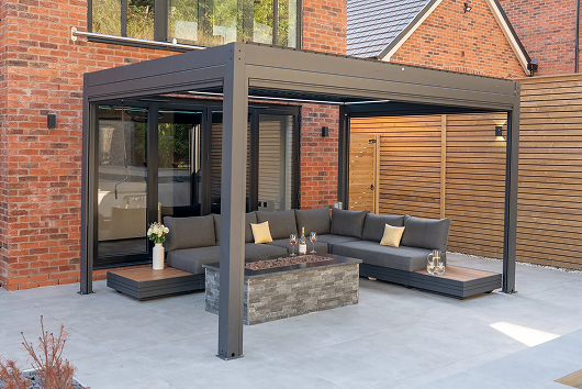 Contemporary garden decking with outdoor dining area and Pergola.