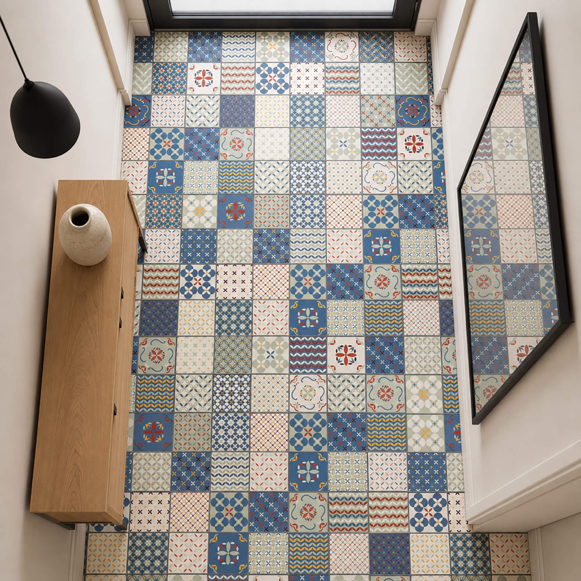 Elevated view of Alhambra Rigid LVT Flooring in a home interior hallway.