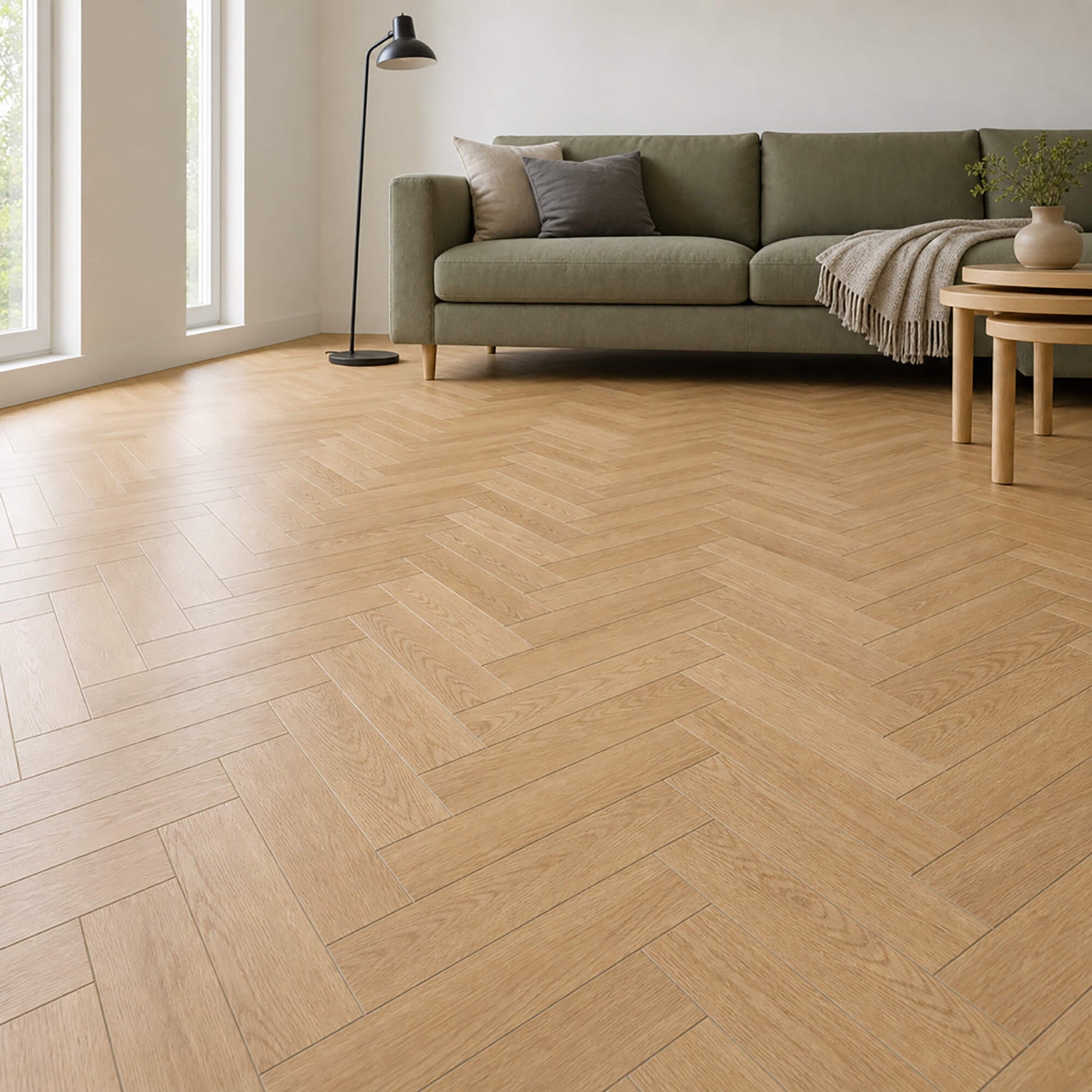 Ashford Oak Herringbone laminate flooring in a modern living room setting.
