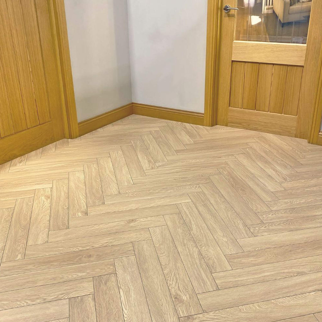 Ashford Oak Herringbone Laminate Flooring in a interior home setting