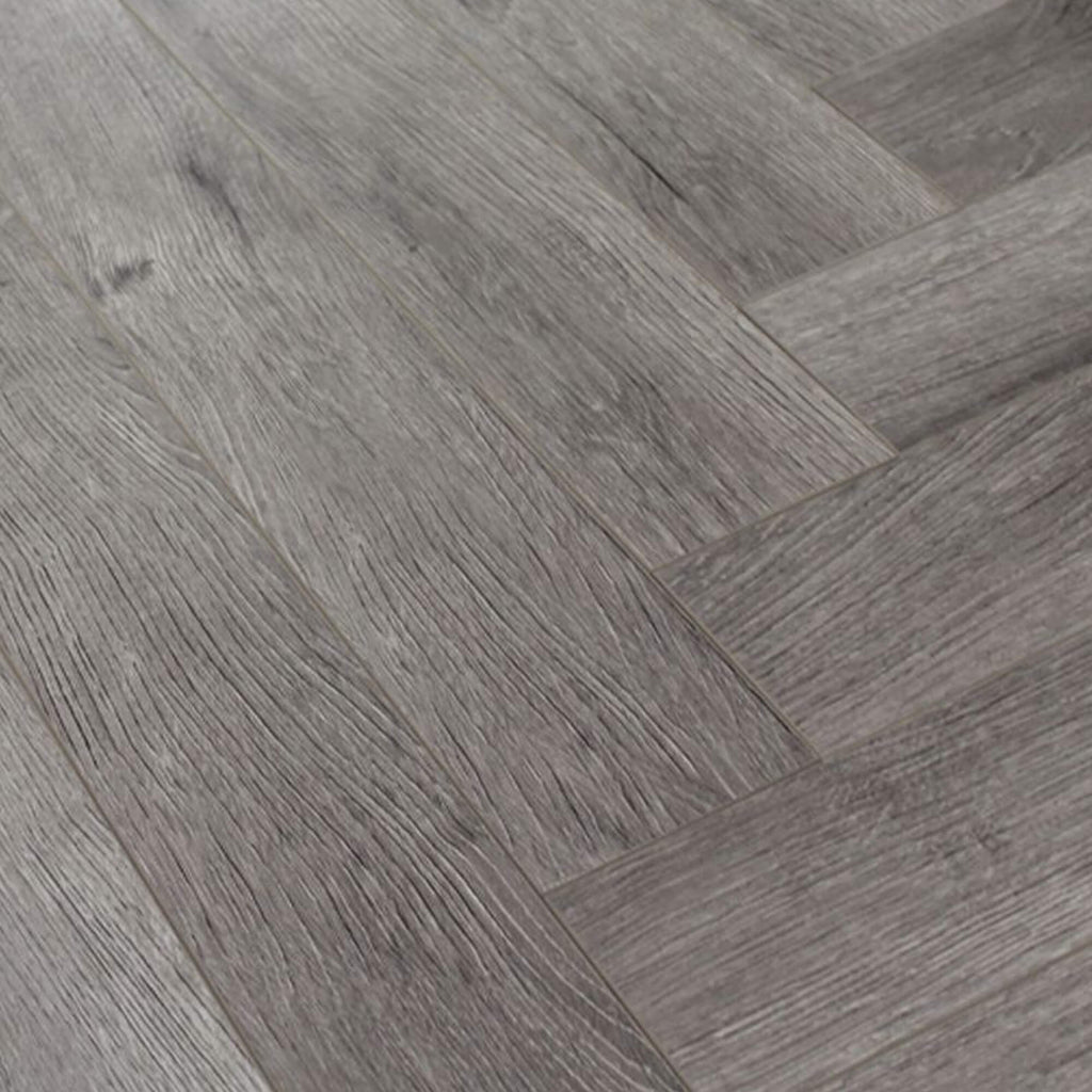 Close-up of Castle Grey Herringbone Laminate Flooring