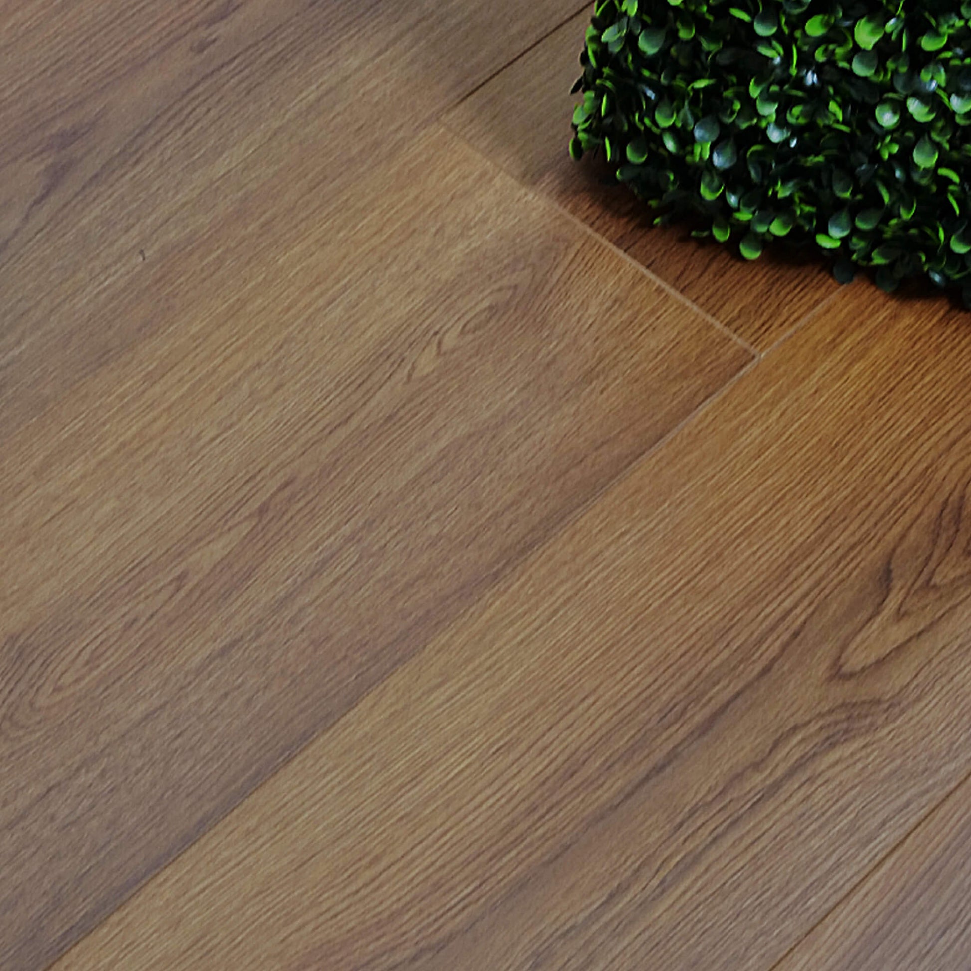 Close-up of the grain and texture of Deep Smoked Oak Prestige Laminate Flooring.