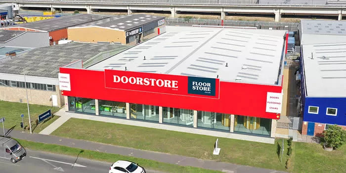 Doorstore floor store building with red and white facade