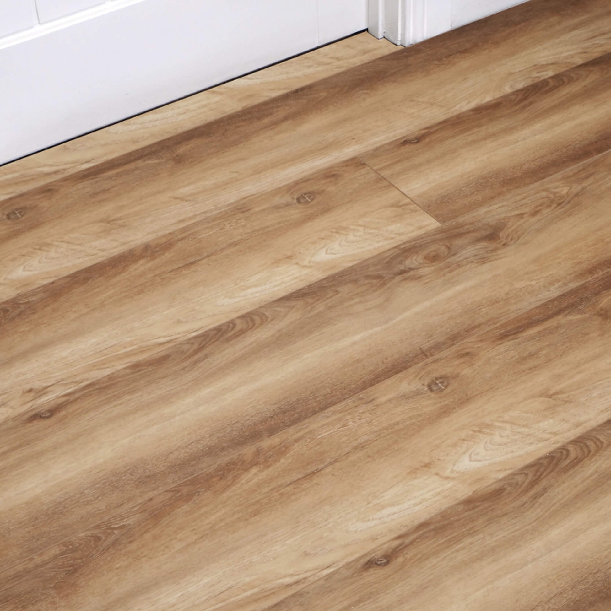Fumed Oak Rigid LVT Flooring with white architrave and door