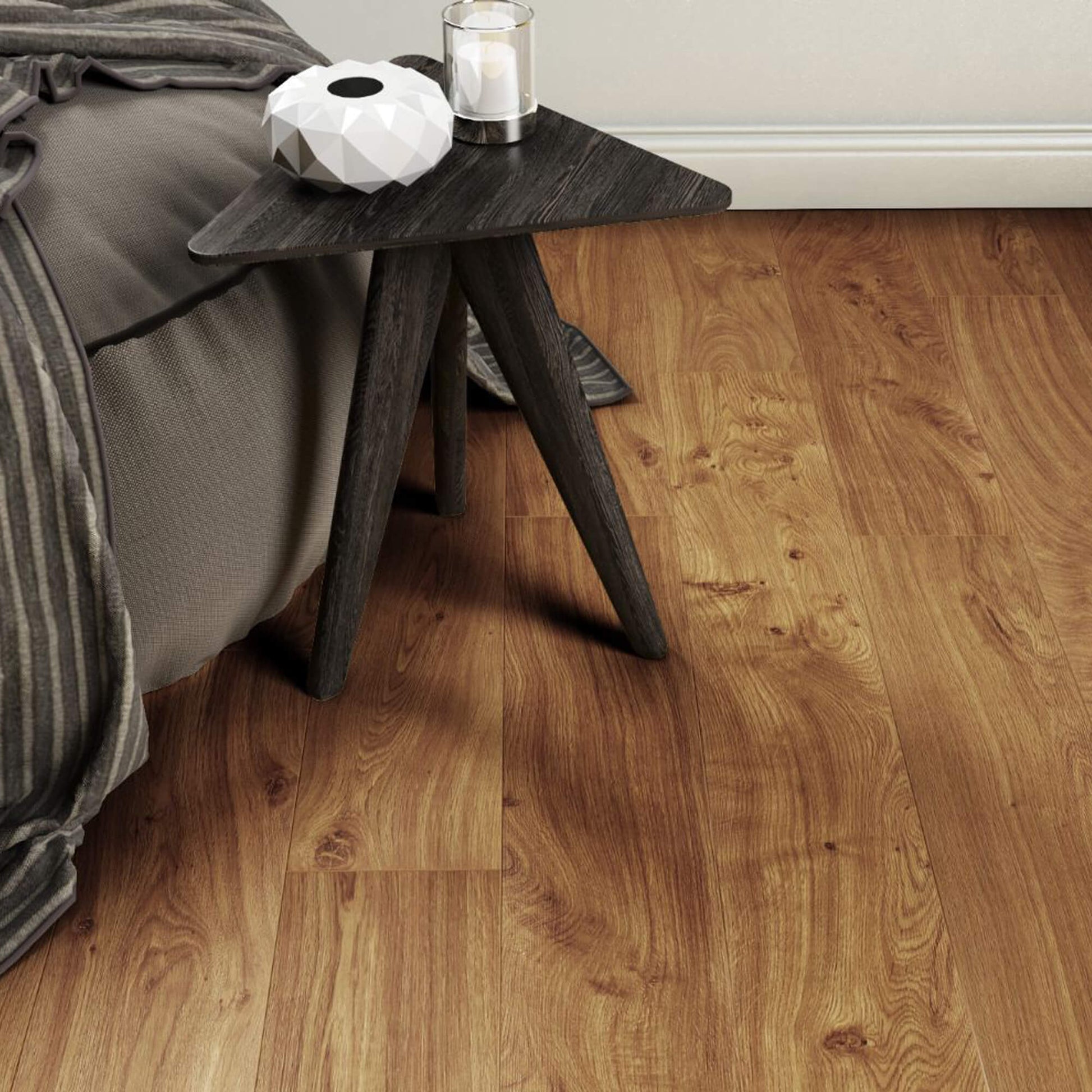 Groovy Oak Country Laminate Flooring in a living room setting with a sofa and side table