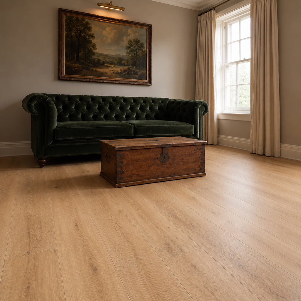 Vintage living room with a green velvet sofa with Heritage Oak Rigid LVT flooring. 