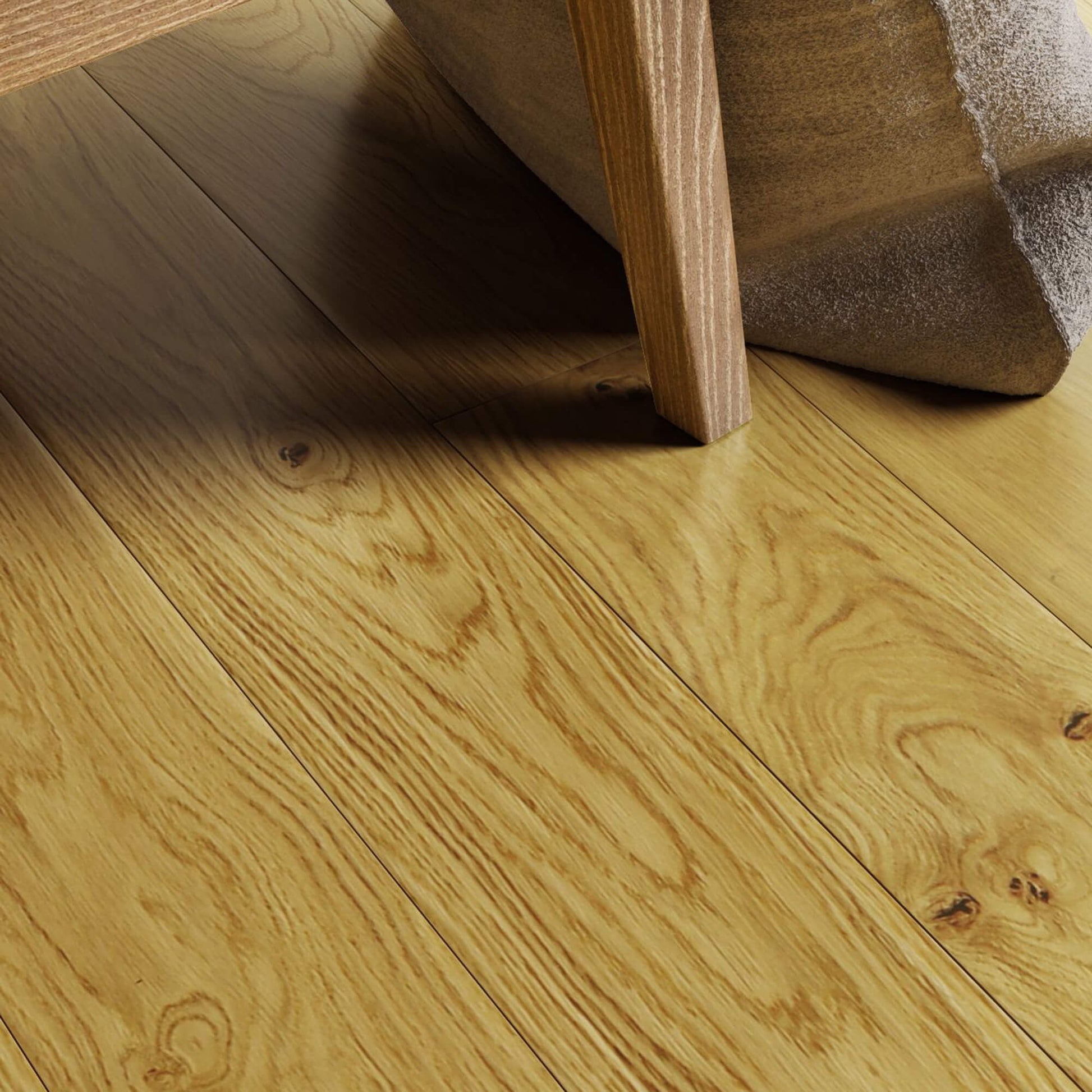Close-up of Natural Oak Lacquered 150mm Engineered Wood Flooring with a piece of furniture partially visible