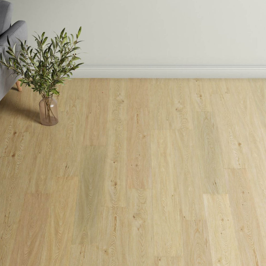 Natural Oak Rigid LVT flooring with a vase of greenery on a light-colored wall background