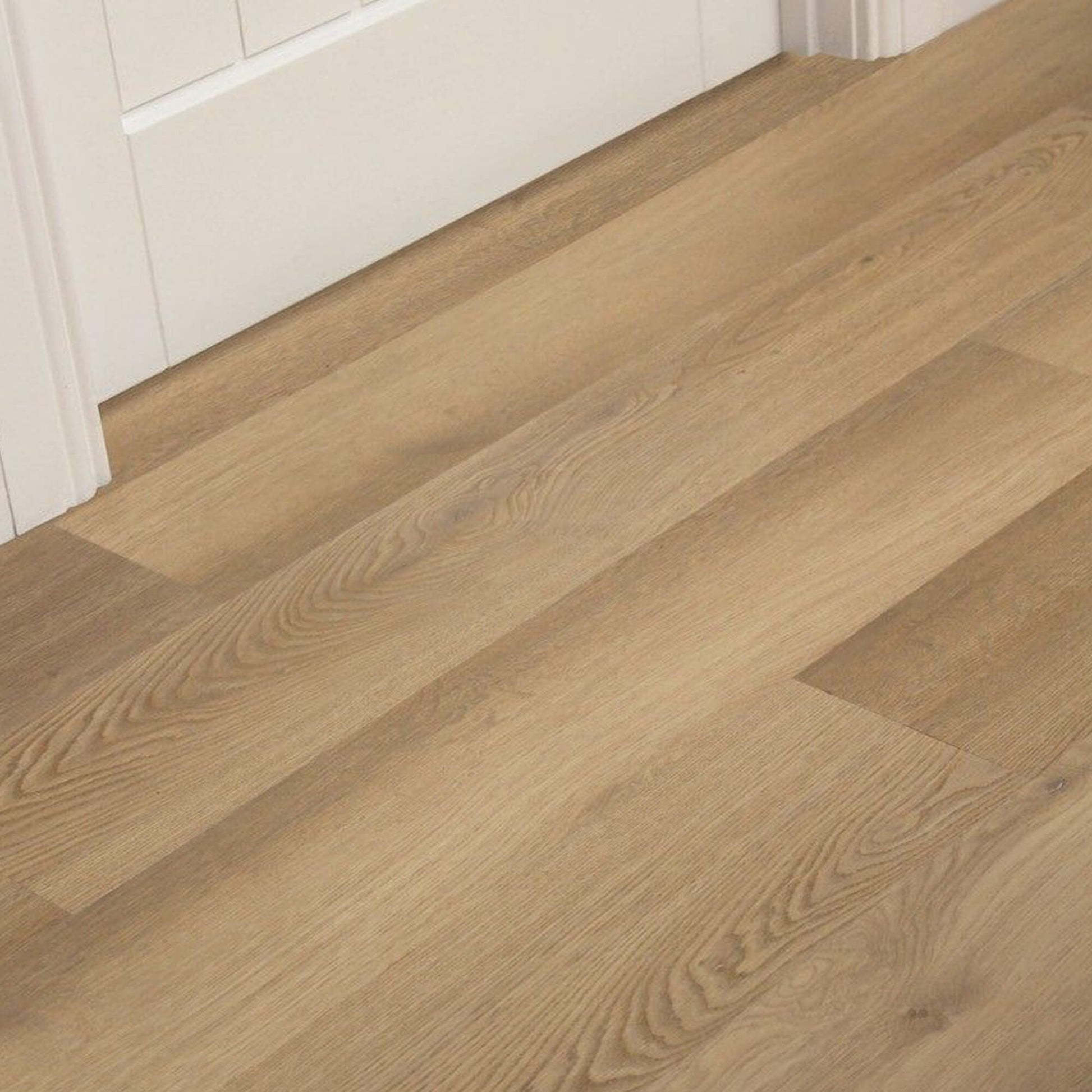 New England Oak Rigid LVT Plank  Flooring in a room setting.