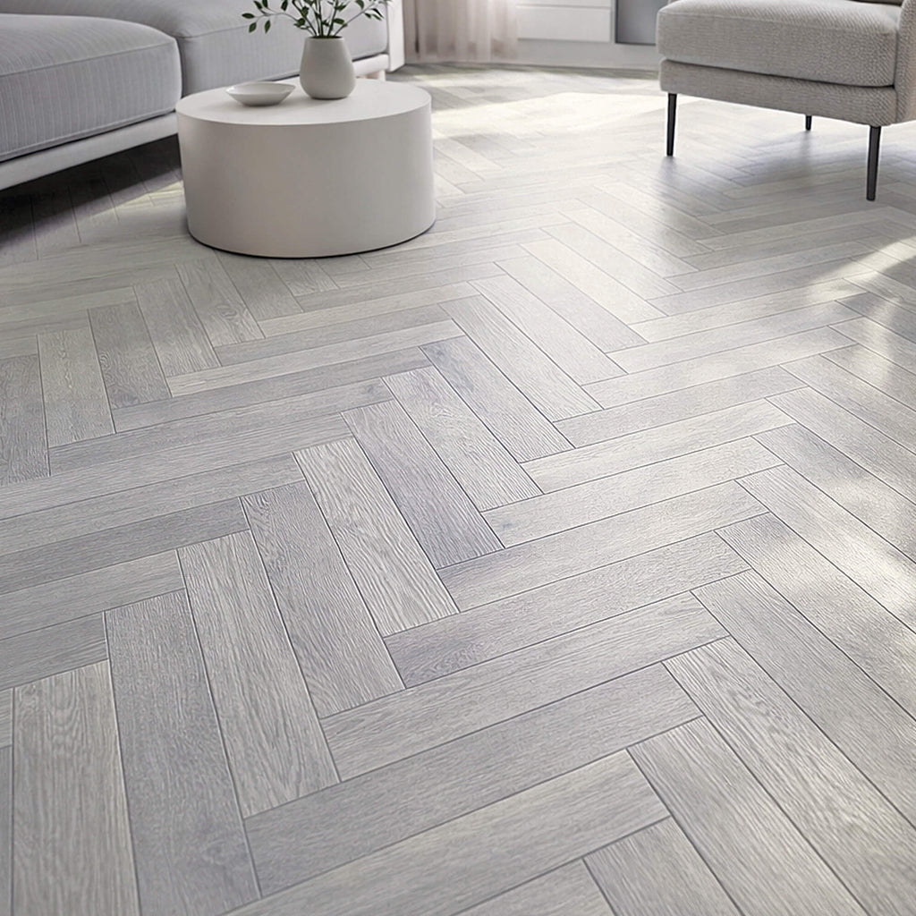 Pyrenees Oak Herringbone Rigid LVT Flooring in a living room setting.