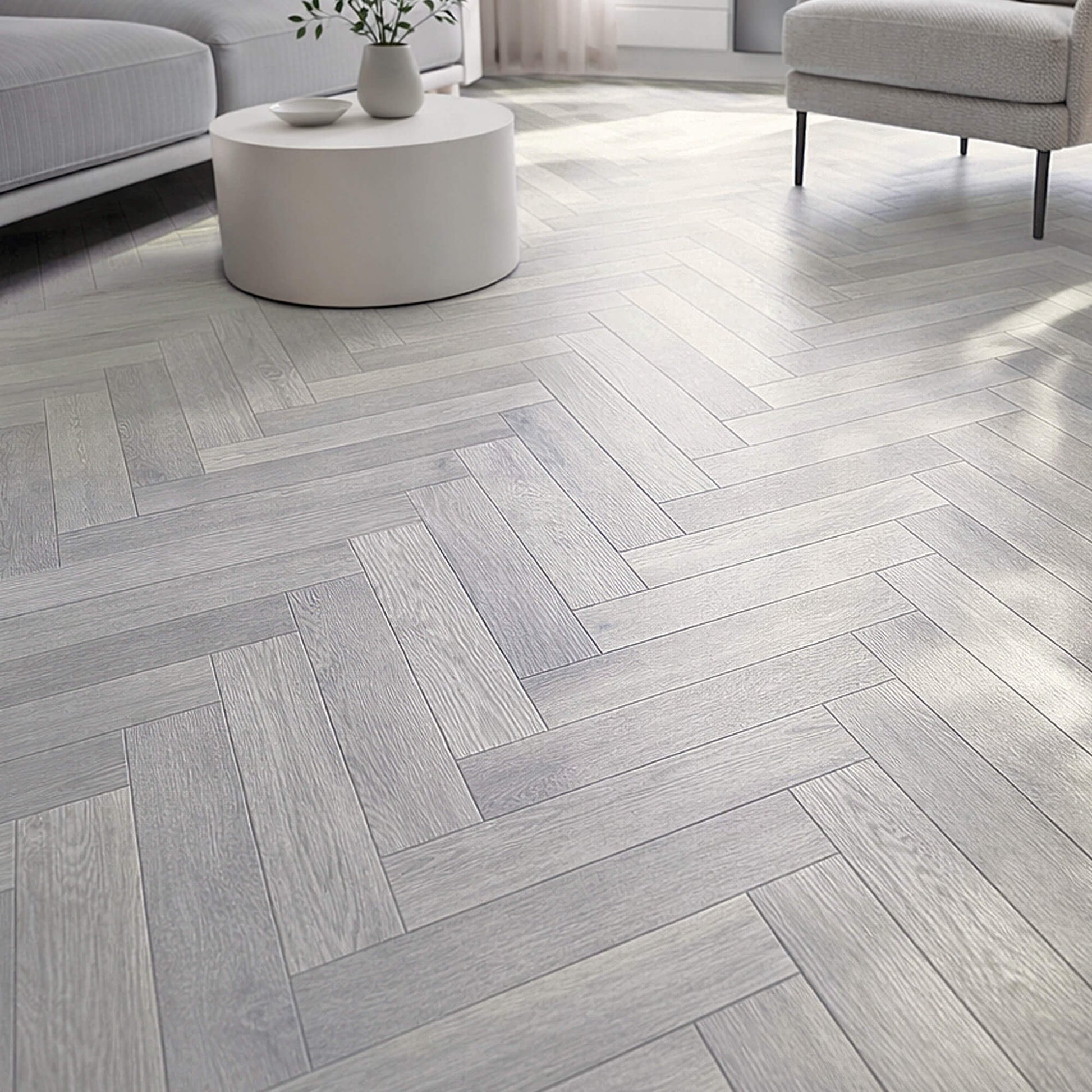 Pyrenees Oak Herringbone Rigid LVT Flooring in a living room setting.