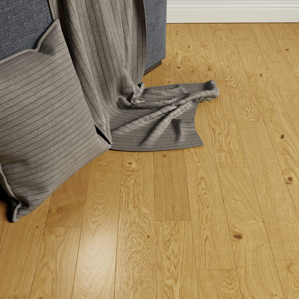Rustic Oak Lacquered 125mm Engineered Wood Flooring with a draped gray blanket and chair corner.