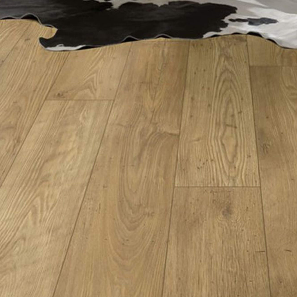 Tawny Chestnut Laminate Flooring with a skin rug in the background