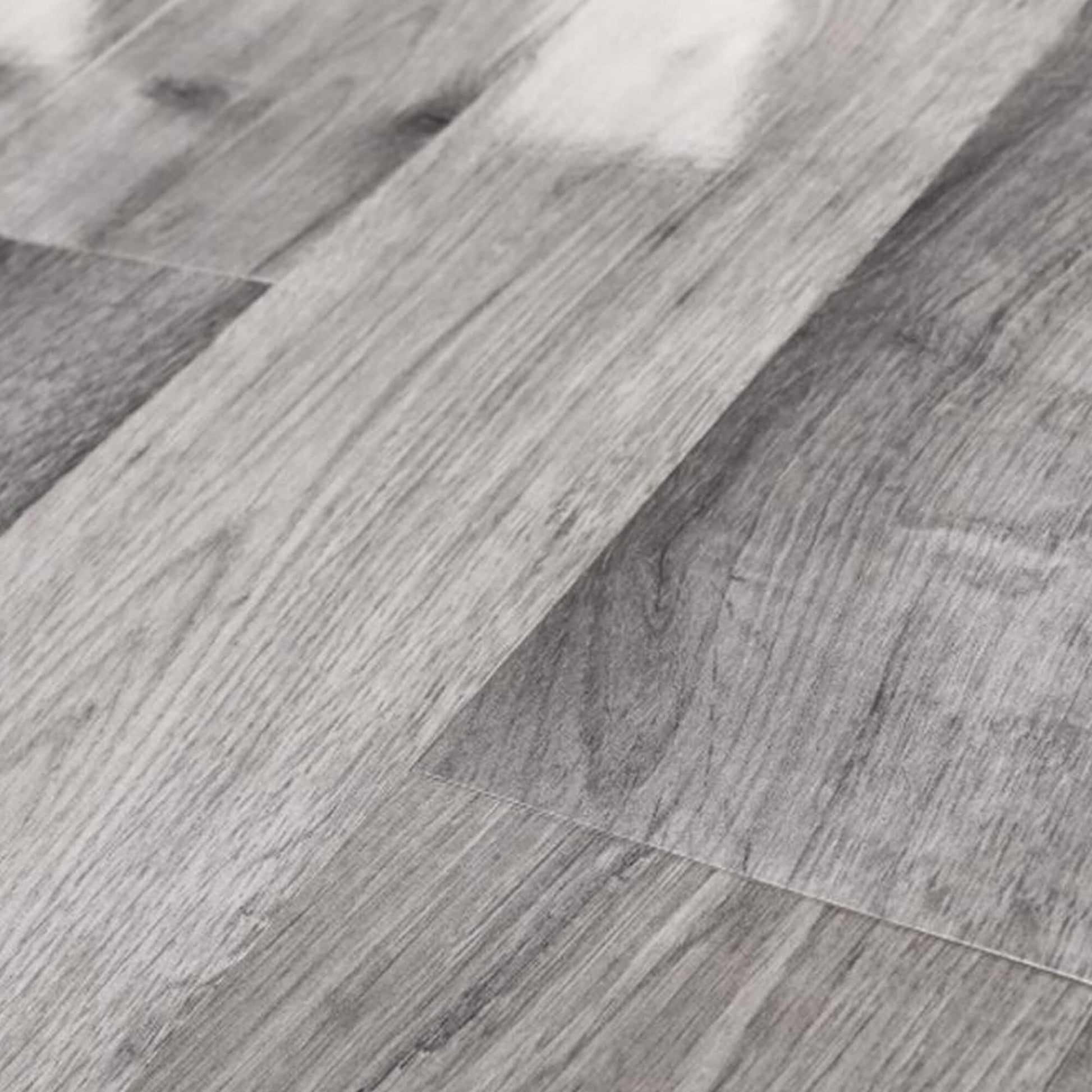 Close-up of the grain and texture on Uptown Oak Gloss Laminate Flooring